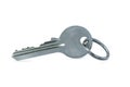 Door silver key house with house shaped metal keychain on white background with clipping path. Royalty Free Stock Photo