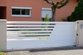 Door stainless white steel garden gate front of suburb family home