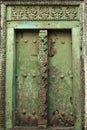 Green carved door in Stone Town, Zanzibar Royalty Free Stock Photo
