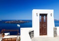 Door to nowhere with views of the sea and the Caldera. One of symbols of Greek island Santorini. Royalty Free Stock Photo