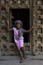 A door in a door with an unique African girl portrait