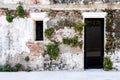 Door and Windows on the old brick wall and old gray cement wall Royalty Free Stock Photo