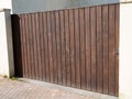 Door wooden gate large design in street view outdoor home portal entrance Royalty Free Stock Photo
