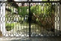 Wrought Iron Door in Front of peaceful Garden