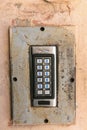 Doorbell button panel and intercom. Royalty Free Stock Photo