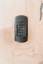 Doorbell button panel and intercom. Royalty Free Stock Photo