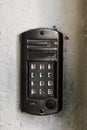 Doorbell button panel and intercom. Royalty Free Stock Photo