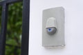 Doorbell or buzzer on mounted on wall