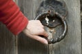 Doorknocker and hand