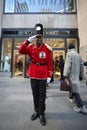 A doorman dressed as a toy soldier stands outside newly reopened the FAO Schwarz flagship store at Rockefeller Plaza