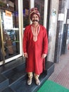 Doorman dressed in traditional Indian clothes in Panagi, Goa, India