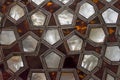 Doors with mother-of-pearl inlay in mosque. Arabic floral seamless pattern - traditional Islamic background