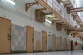 doors of prison cells in the corridor Royalty Free Stock Photo