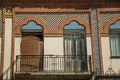 Doors to balcony on building with ceramics tiles at Merida Royalty Free Stock Photo