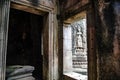 The doors and windows in Bayon Temple overlook the Na Apsara sandstone carvings outside in Angkor Thom, Siem Reap