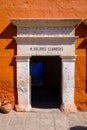 Doorway in a colourful red wall