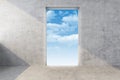 Doorway in concrete wall with heaven Royalty Free Stock Photo