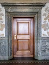 Doorway features ornate marble construction