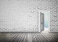 Doorway opening to blue sky in grey brick wall room