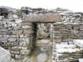 A doorway and stone lintel in the Broch of Gurness