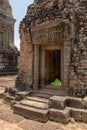 Doorway to ruined temple with decorated pediment