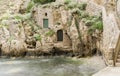 Doorways in the Rocks at Kolorina Bay, Dubrovnik Royalty Free Stock Photo