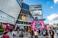 Doota shopping mall exterior view with people and Seoul city sign in Dongdaemun market Seoul South Korea