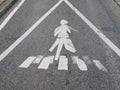 Doppelganger or double: warning sign at a crosswalk Royalty Free Stock Photo