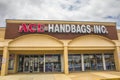 View of ACE Handbags Inc. Store front and sign