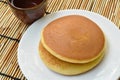 Dorayaki Japanese pancake stuffed sweet mashed bean on plate eat with tea cup