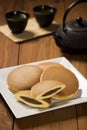 Dorayaki, Japanese Sweet Bean Pancakes, and Green Tea Royalty Free Stock Photo