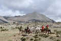 Dorchen, Tibet, China, June, 18, 2018. Men on horses making parikrama around Kailas in Tibet