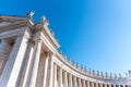 Doric Colonnade with statues of saints on the top. St. Peters Square, Vatican City Royalty Free Stock Photo