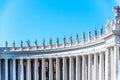 Doric Colonnade with statues of saints on the top. St. Peters Square, Vatican City Royalty Free Stock Photo