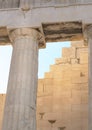 Doric column in front of part of the wall in Athens Royalty Free Stock Photo