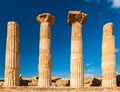 Doric columns of the Heracles temple in Agrigento with blue sky in background Sicily, Italy Royalty Free Stock Photo