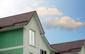 Dormer windows on metal roof. Metal Roofing. Royalty Free Stock Photo