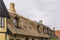 Dormers on straw roof of traditional terraced house, Dragor, Denmark