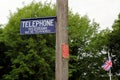 Dorset, UK - May 31st 2016: Vintage British telephone telegraph and telegram signs on a traditional wooden pole.