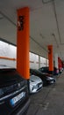 Dortmund, Germany - December 28, 2021: Sixt car rental employee waits for customers at Dortmund Airport