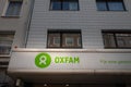 DORTMUND, GERMANY - NOVEMBER 5, 2022: Oxfam logo in front of their local charity shop in Dortmund, Germany. Oxfam is an NGO Royalty Free Stock Photo