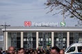 DORTMUND, GERMANY - NOVEMBER 13, 2022: Selective blur on the Dortmund Hauptbahnhof train station with crowd of passengers rushing