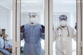 3 of Dortor, Nurse and patient looking out in the quarantine room - 19 Concept Royalty Free Stock Photo