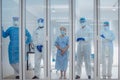 Dortor, Nurse and patient looking out in the quarantine room - 19 Concept Royalty Free Stock Photo