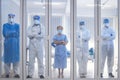 Dortor, Nurse and patient looking out in the quarantine room - Covid 19 Concept Royalty Free Stock Photo