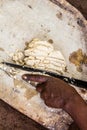 Dorze woman is preparing dough for kocho bread made of enset & x28;false banana& x29;, important source of food, Ethiop