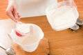Dosing flour Royalty Free Stock Photo