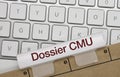 Dossier CMU - Inscription on White Keyboard Key