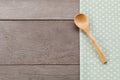 Dot textile texture, wooden swooden spoons on wood textured background