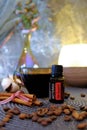 Doterra essential oils. for protective oil. Against the background of coffee beans and cinnamon sticks.medicinal vials.